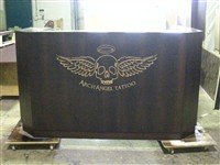Reception Desk front with deep etch and glaze